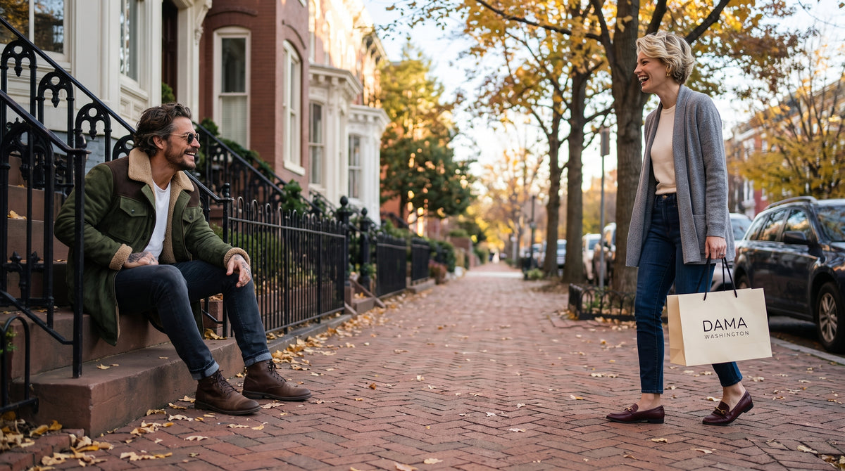 Laughing couple on an autumn Georgetown street, man on a stoop in an olive sherpa jacket, woman with a Dama Washington shopping bag