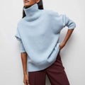 Dama Washington Isla women's oversized turtleneck sweater light blue short sleeve - front view